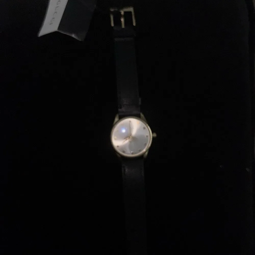 Brand new with box and dustbag Gucci Black and Gold Watch women's